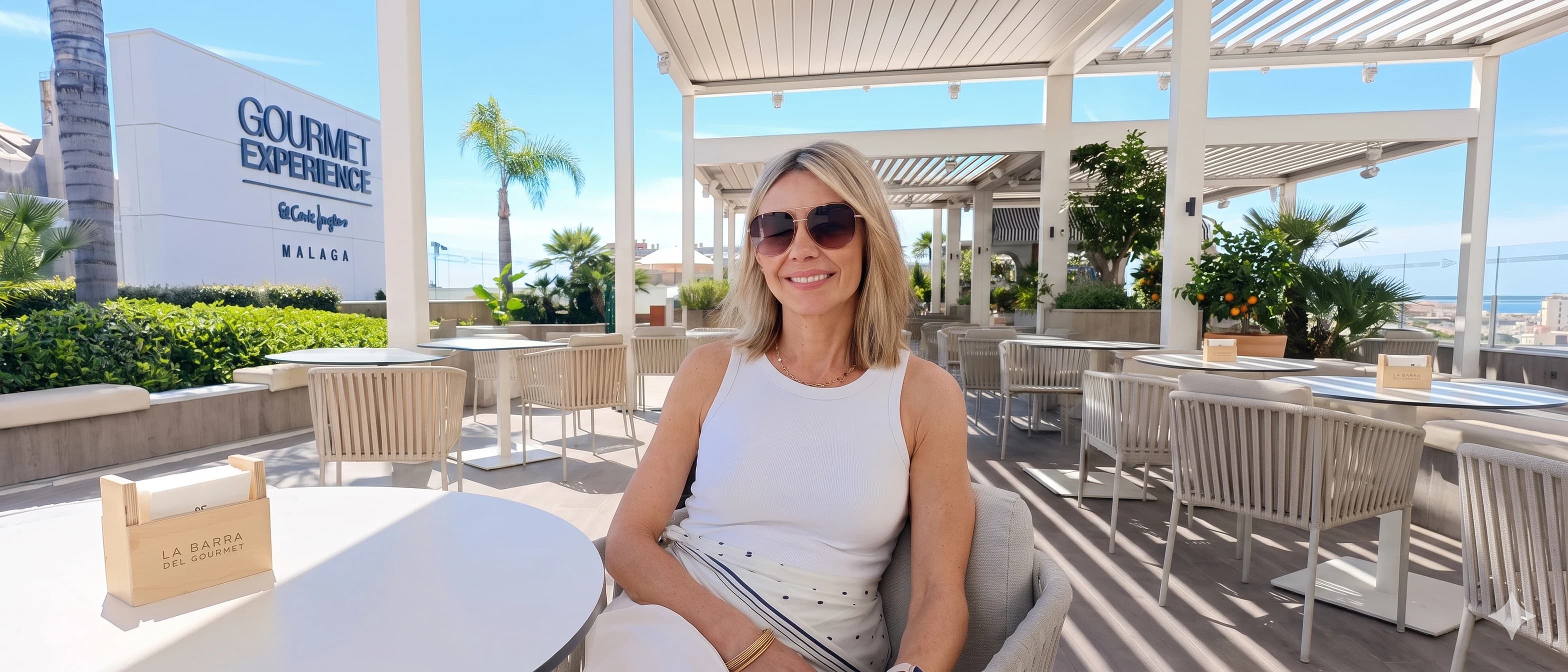 Anna Collins at a café terrace in Málaga — local guide since 2007